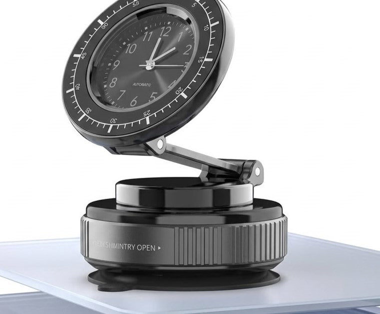 vacuum suction base and a detachable analog clock.
