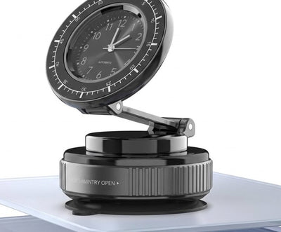 vacuum suction base and a detachable analog clock.